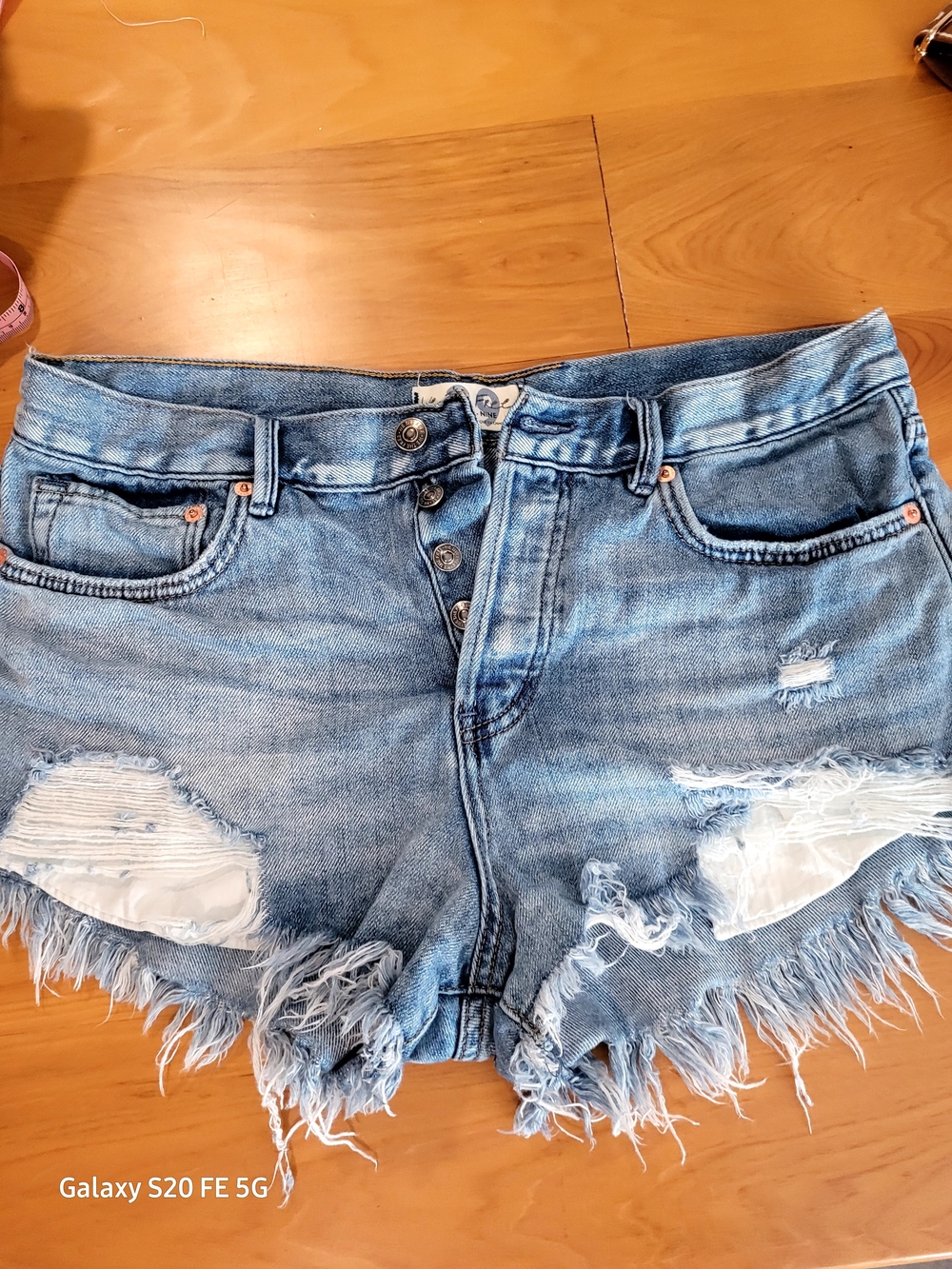 We The Free Light Blue Distressed Denim Cutoff Shorts